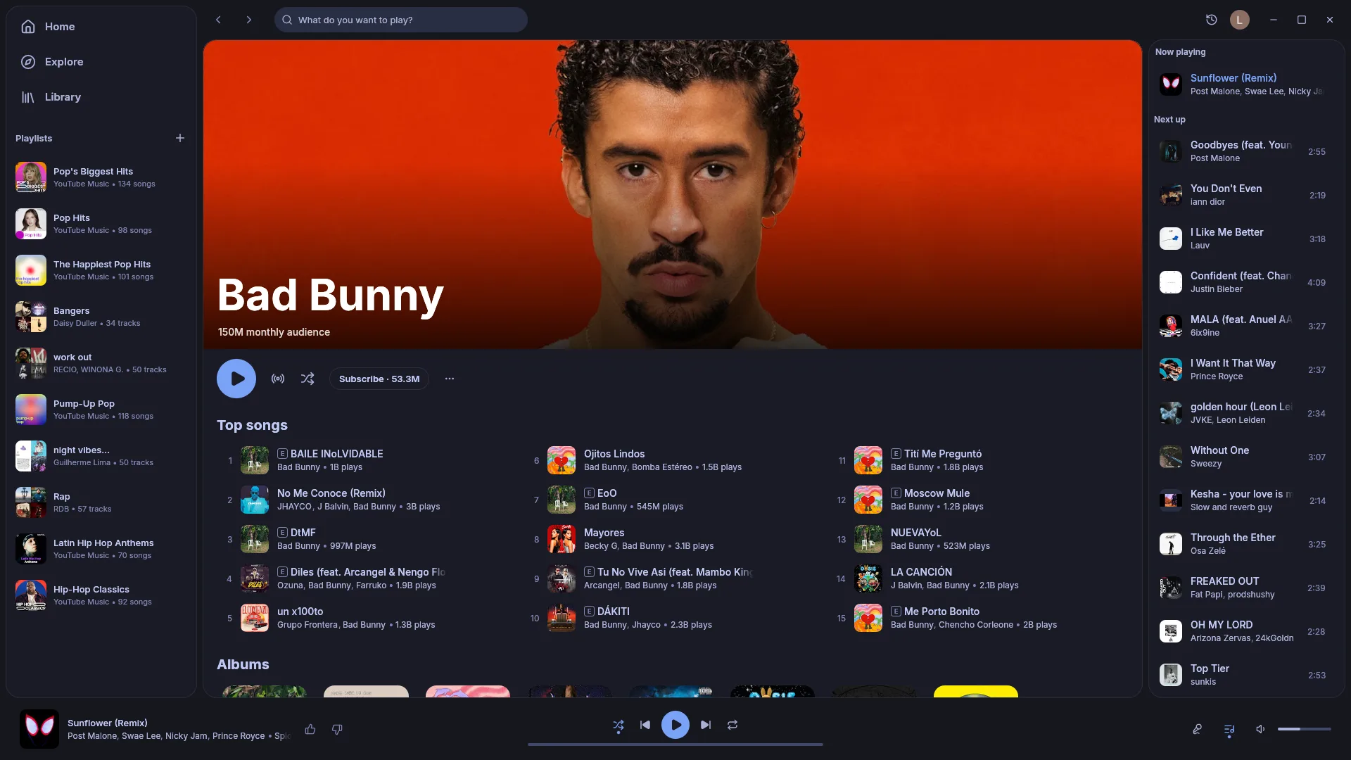 An artist page with its banner and top songs, and the queue open